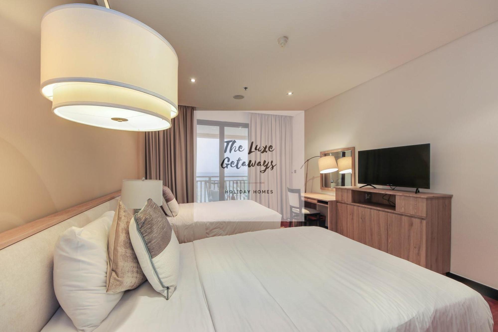 Luxe Getaways Royal Amwaj Palm Jumeirah Resort Apartment Holiday Home ดูไบ ภายนอก รูปภาพ